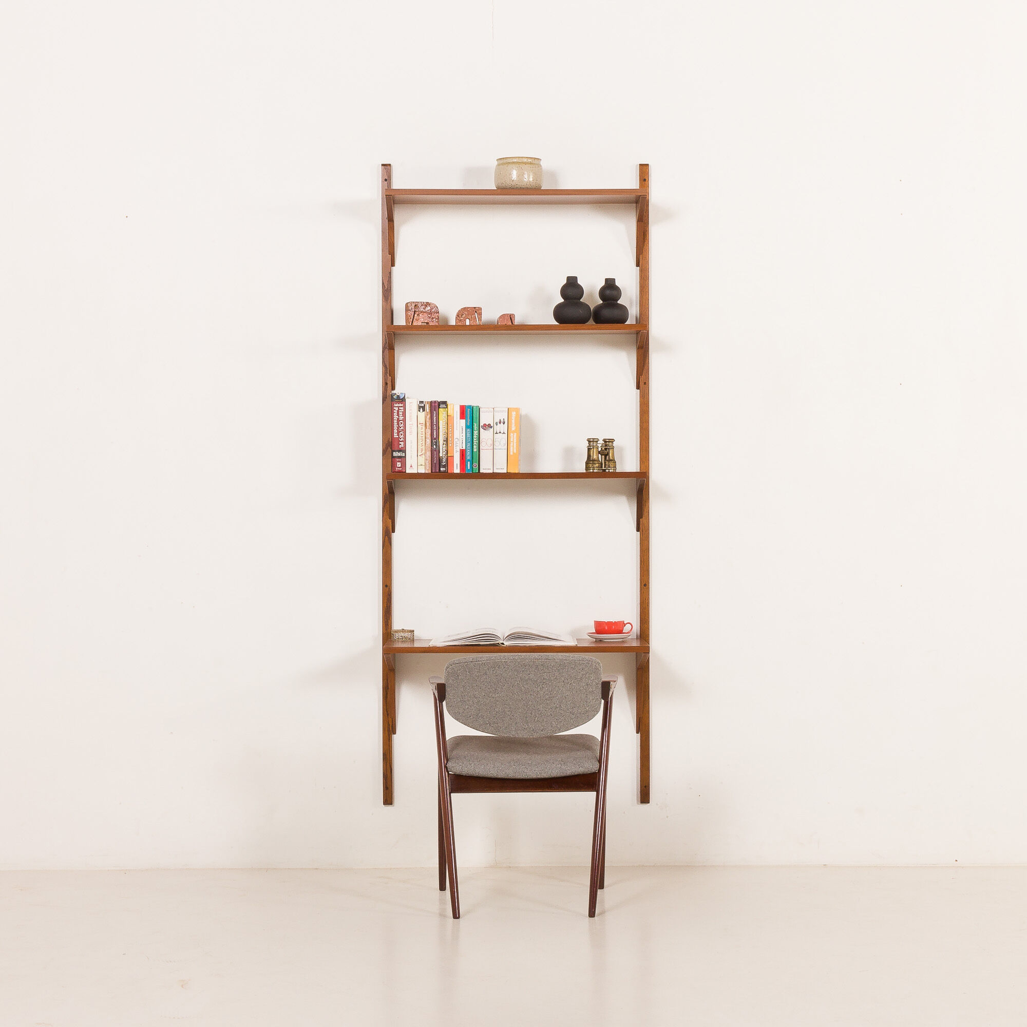 Danish mid-century walnut shelving unit in the style of Poul Cadovius, 1960s