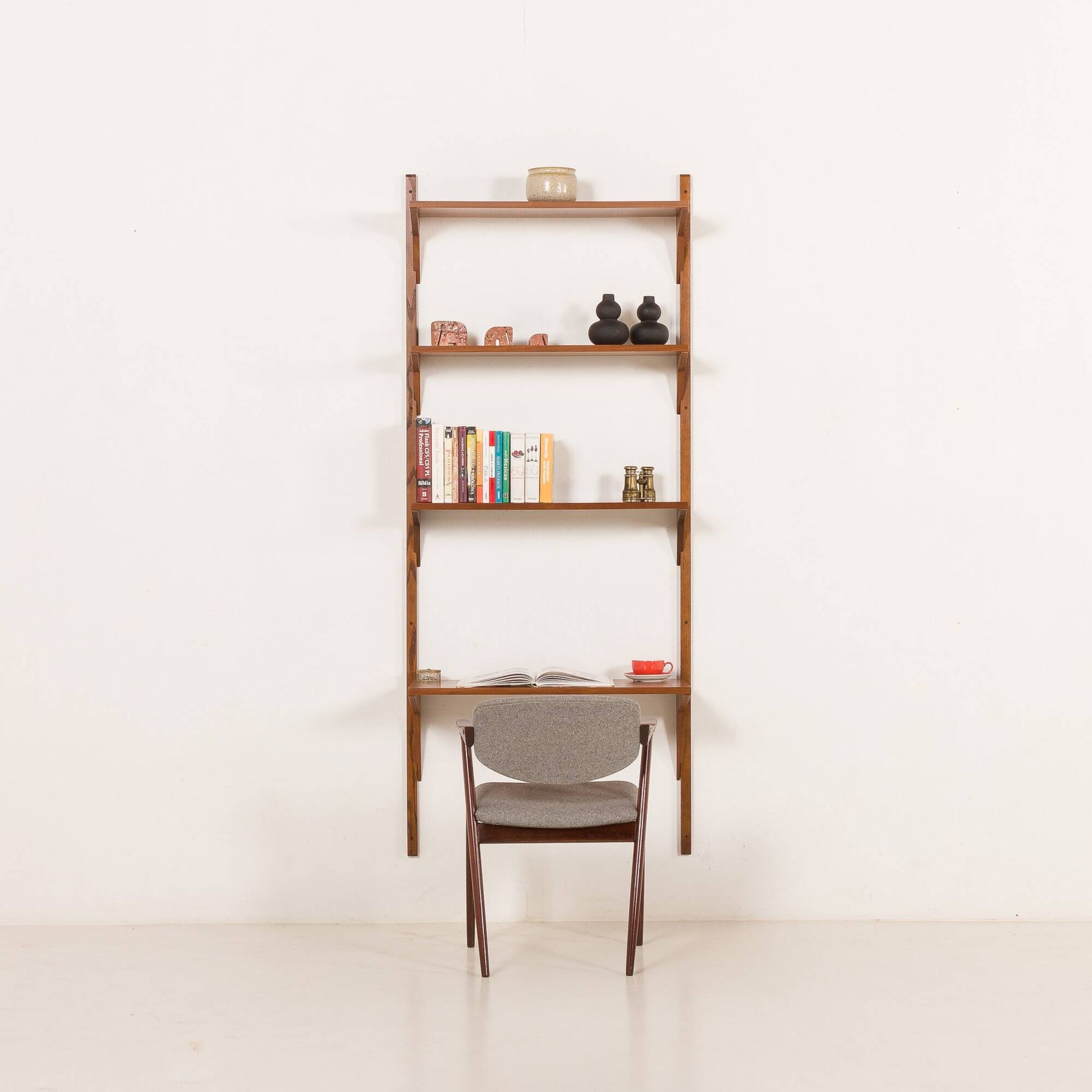 Danish mid-century walnut shelving unit in the style of Poul Cadovius, 1960s