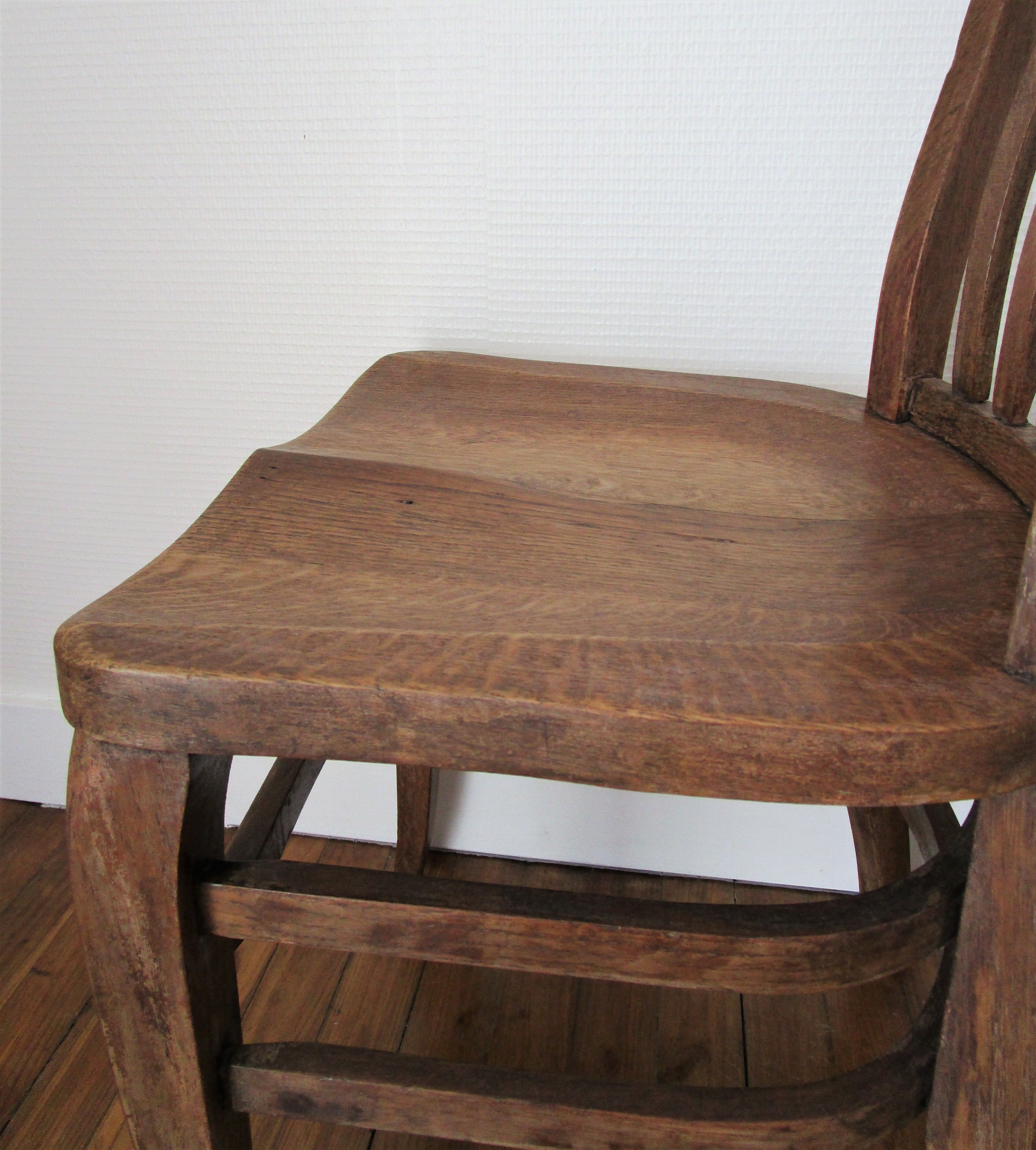 Two chairs solid oak patinated early twentieth century