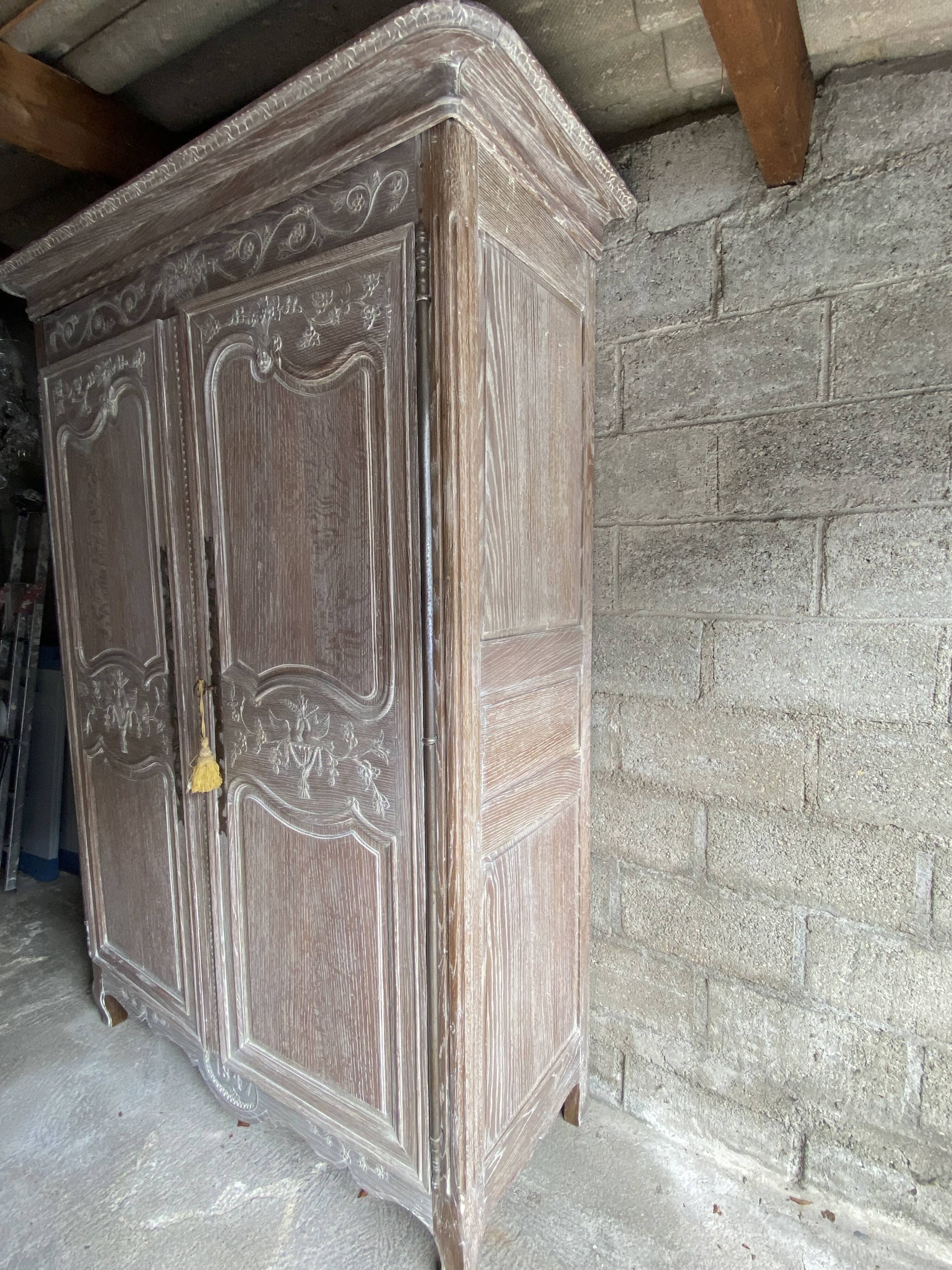 19th century limed oak wardrobe.