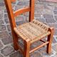 Small chair for children, folk art, wood and straw.