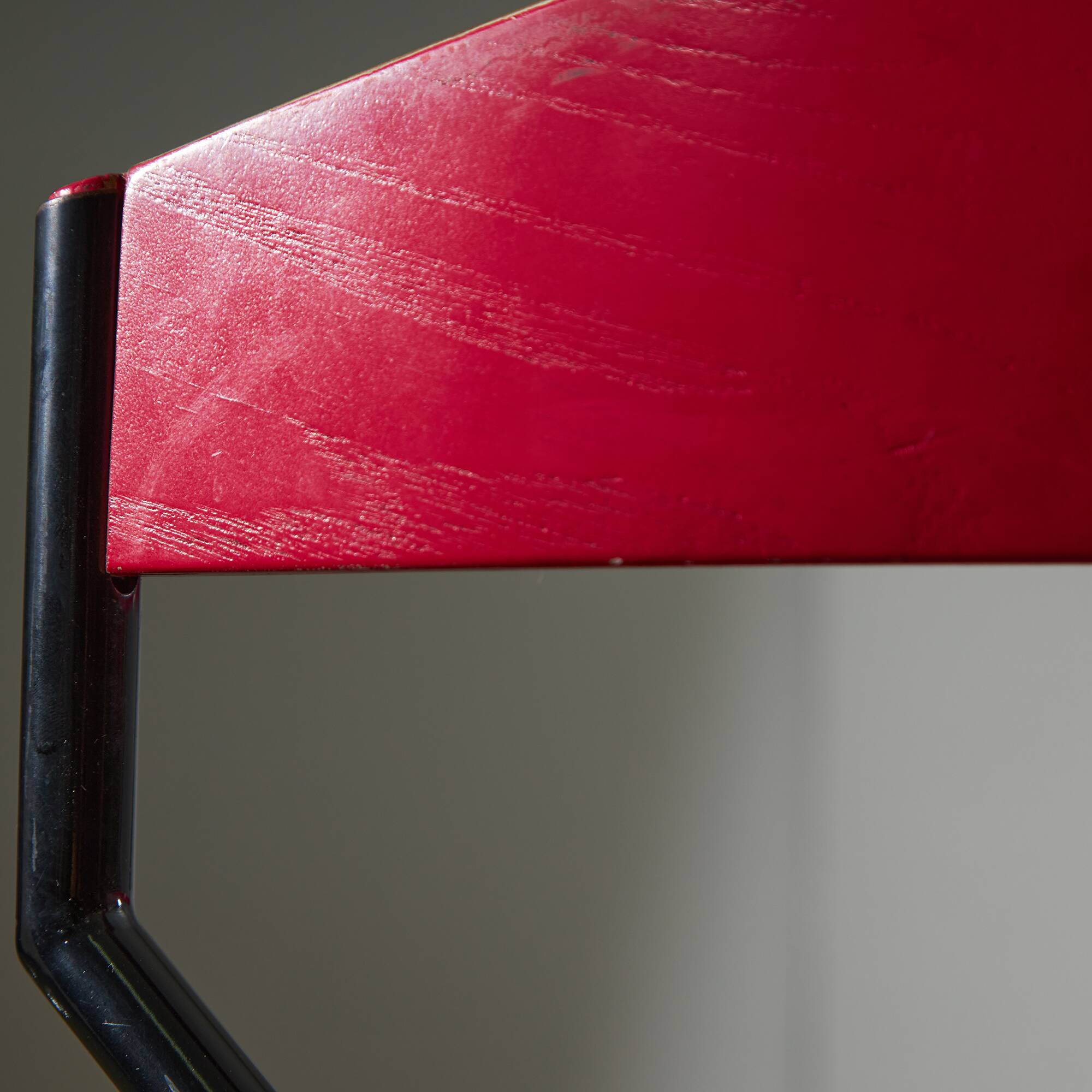 Red Plywood and Curved Metal Frame Chair