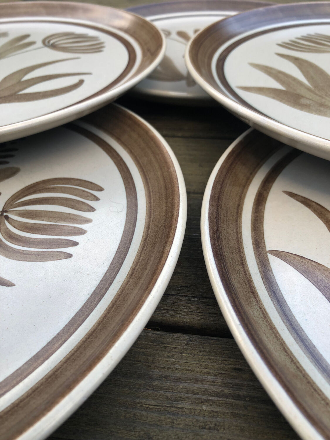 7 Longchamp stoneware plates