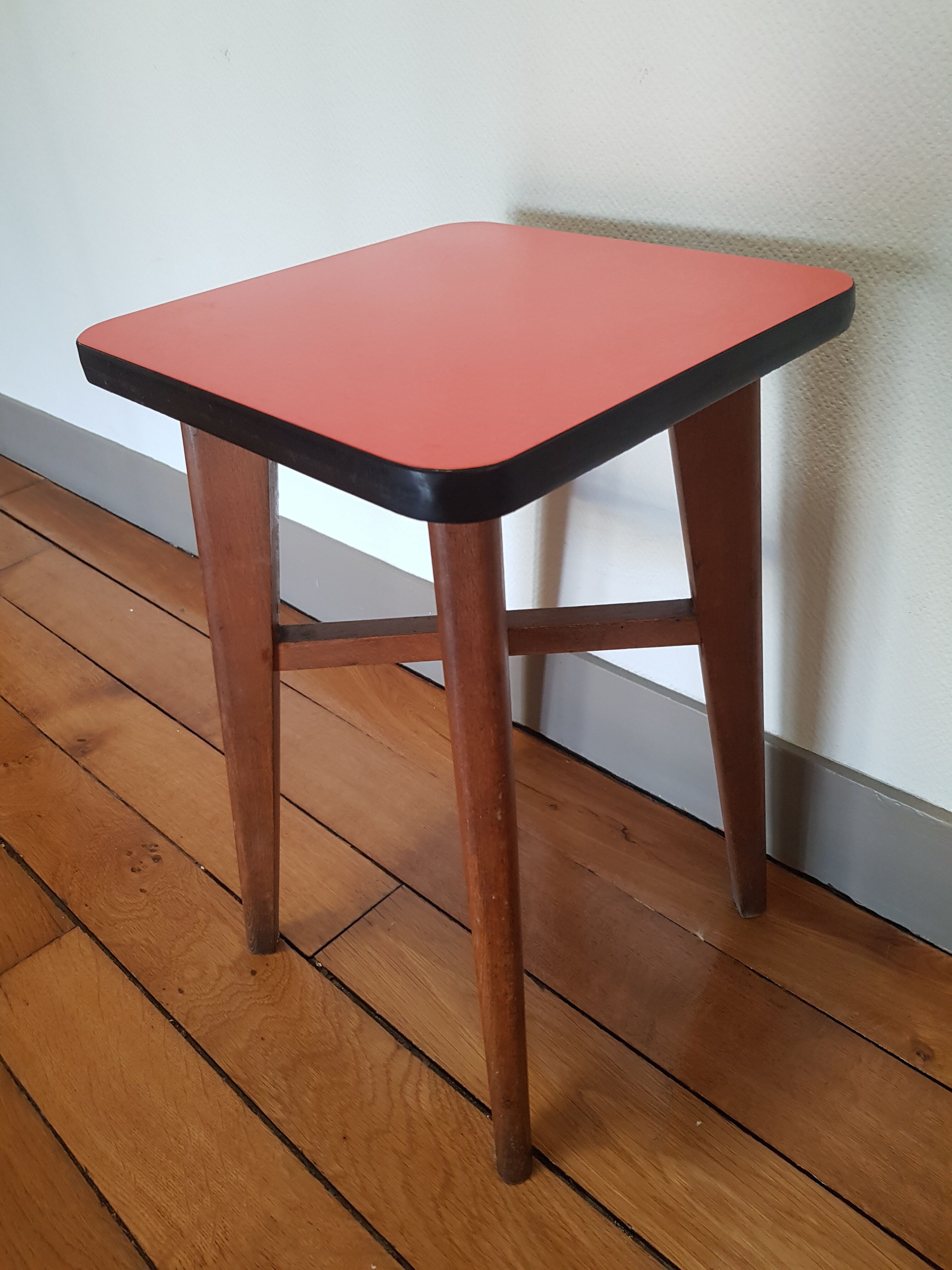 Wooden and red formica stool