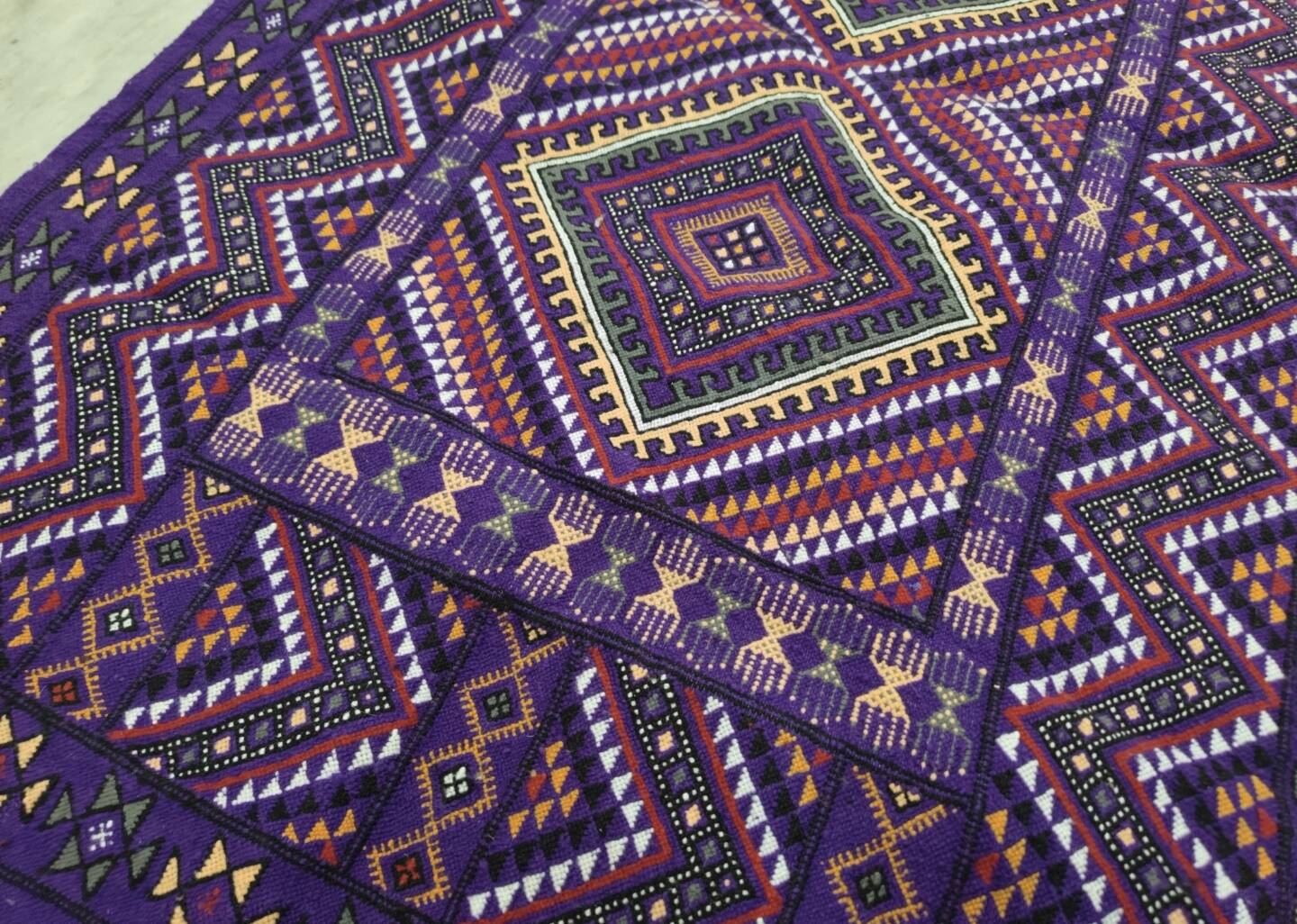 Hand-woven purple margoum rug in natural wool