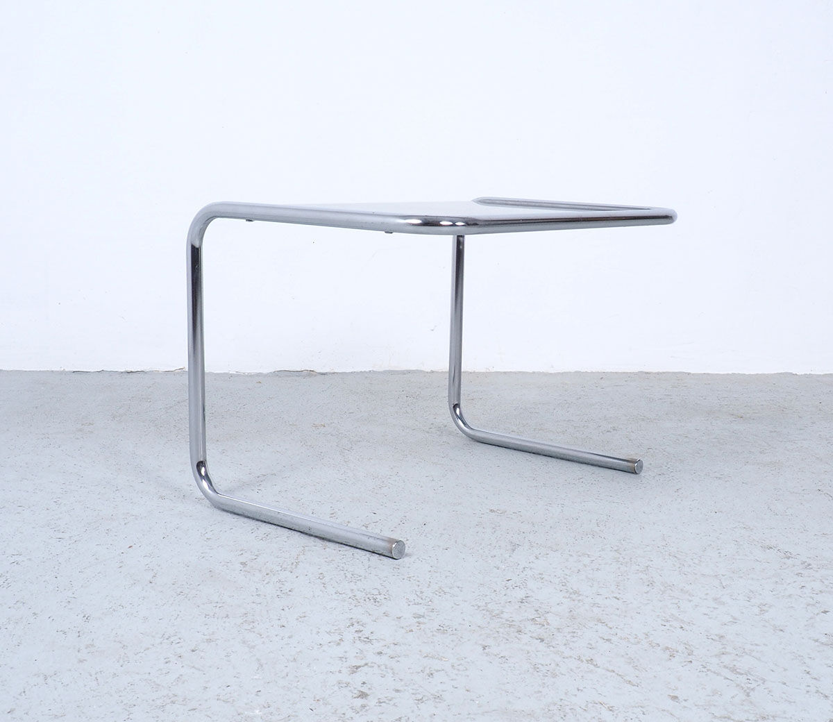 Vintage chromed nesting tables with smoked glass