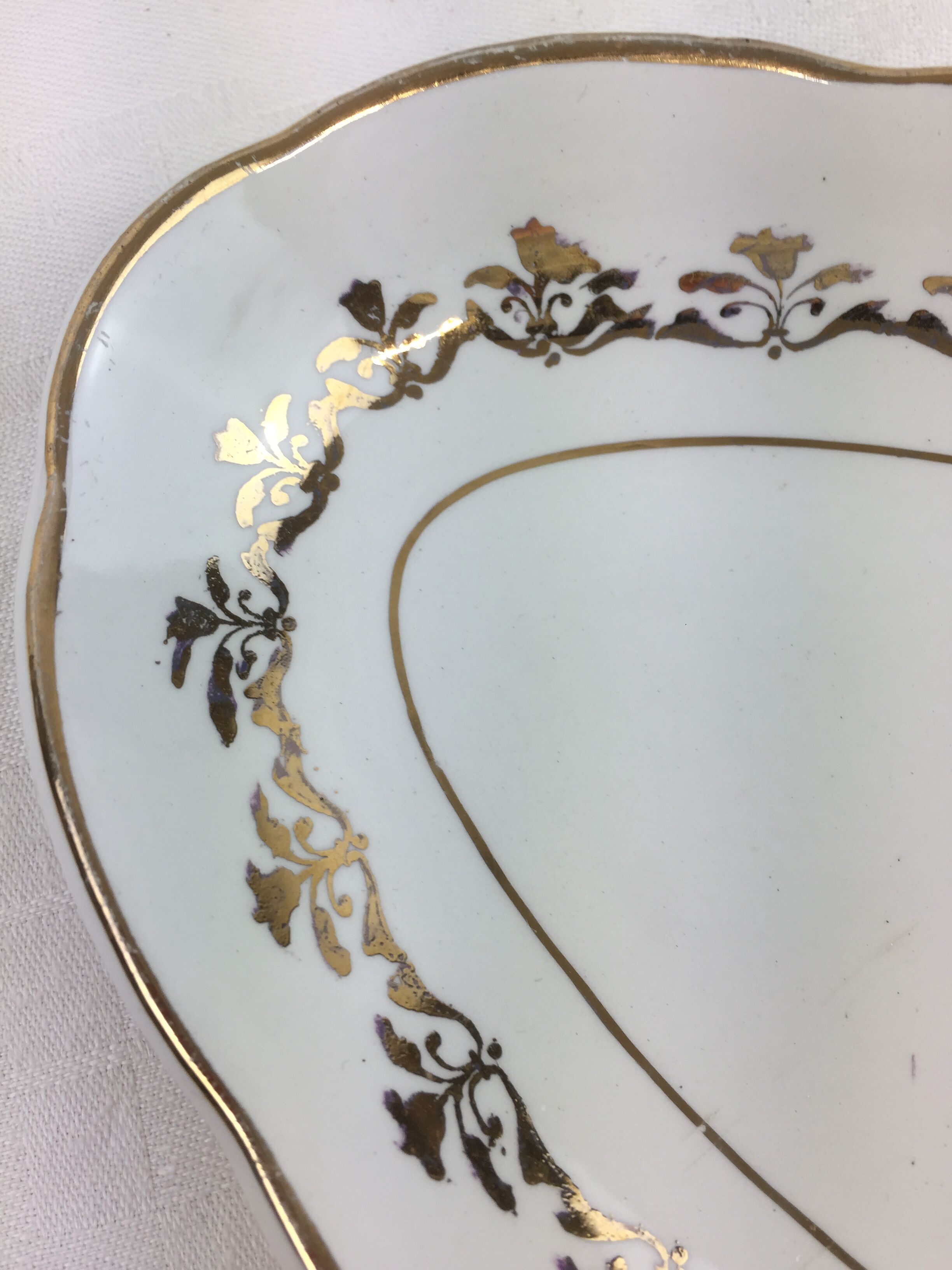 Antique oval shaped white and gold dish made in France Sarreguemines