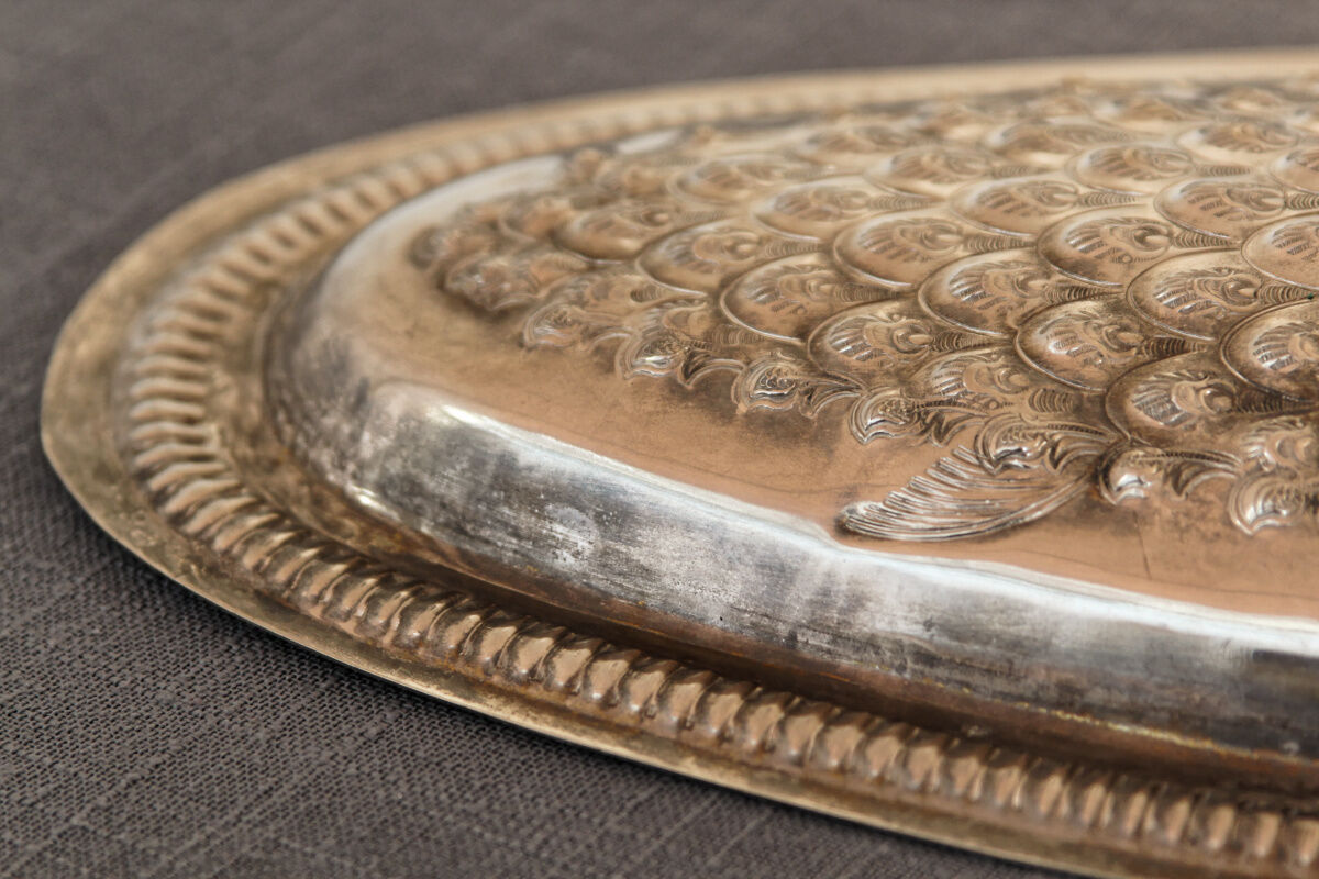 Ancient fish dish in silver metal