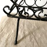 Wrought iron magazine rack from the 50s
