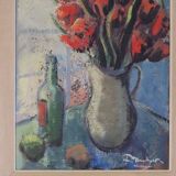 Bouquet rouge et bouteille de vin