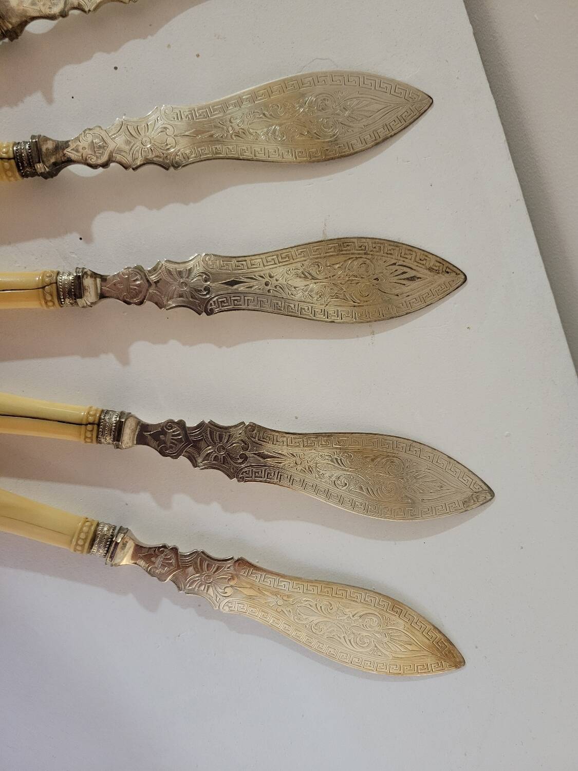 English fish knives in silver and ivory, 19th century