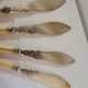 English fish knives in silver and ivory, 19th century