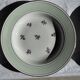 Set of 9 vintage turquoise deep plates with gold trim and pink flowers.