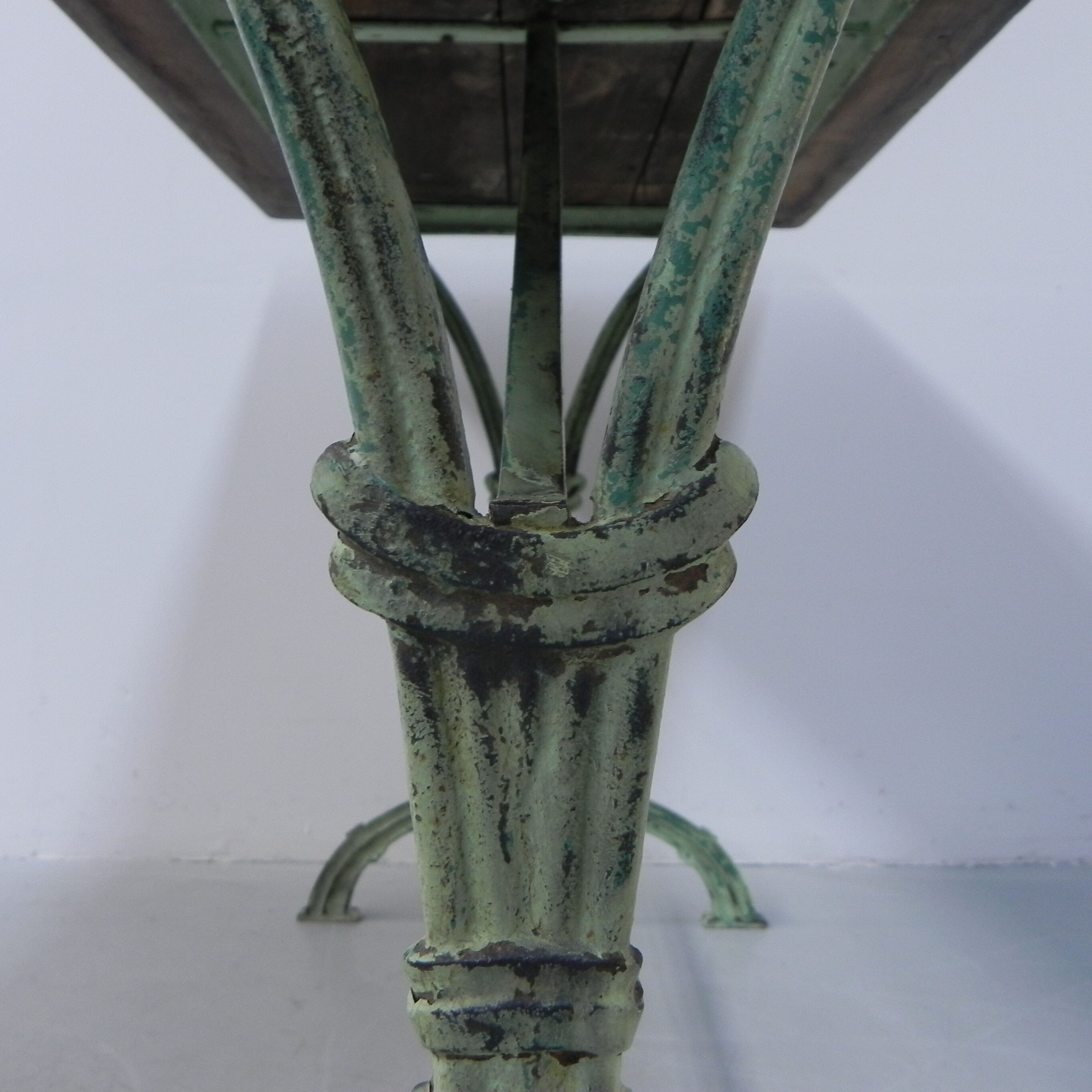Art nouveau bistro table with cast iron frame