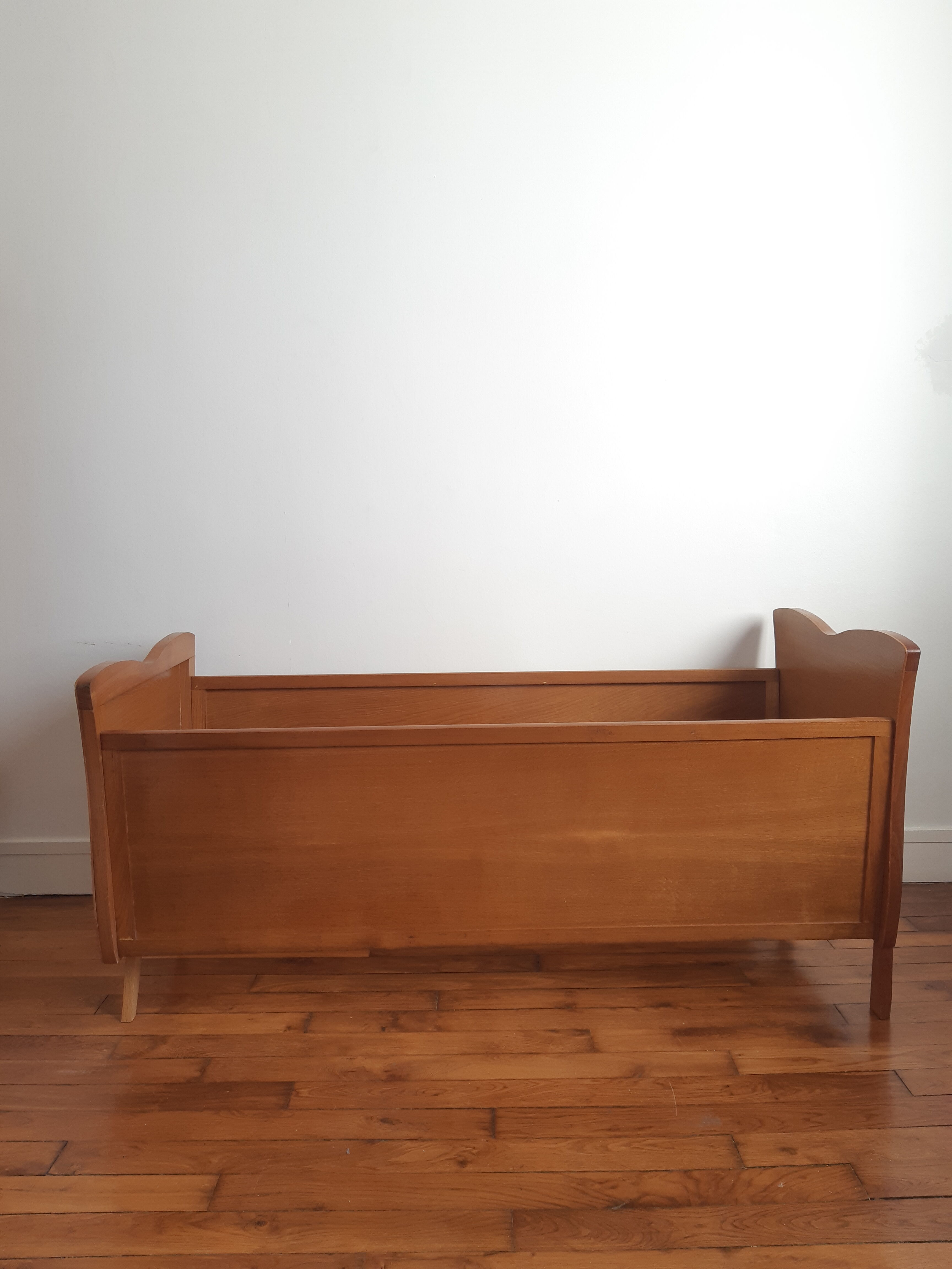 Wooden bed and vintage rattan