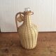 Vintage wicker bottle