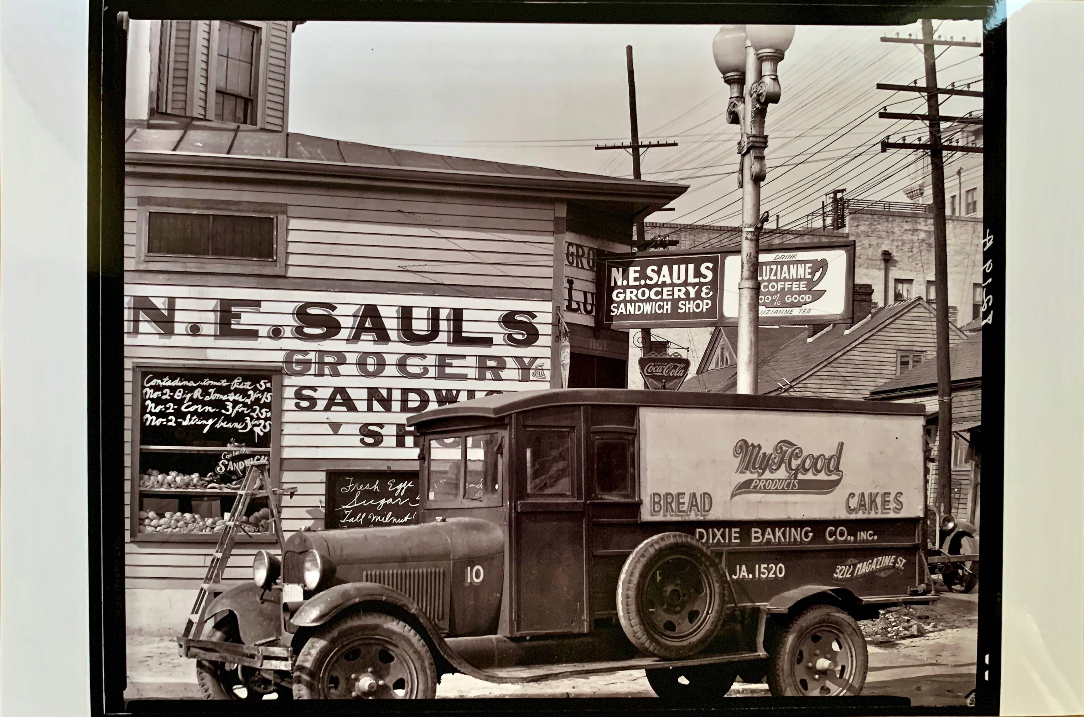 "Street corner in New Orleans, front of the NE Saul' sandwich shop