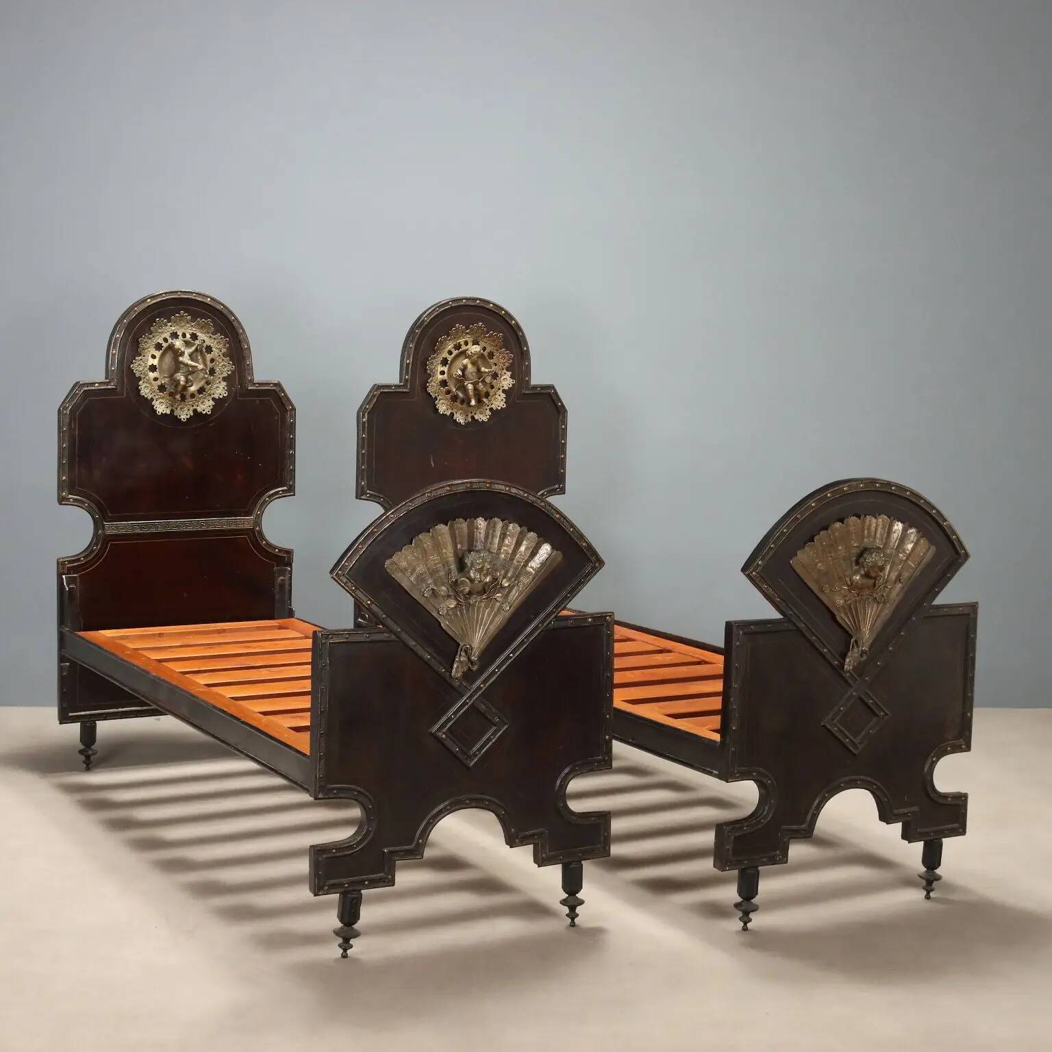 Pair of antique single beds in metal and bronze, Italy, 19th century.