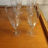 Six engraved crystal champagne flutes