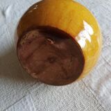 Glazed ocher round pitcher with handle
