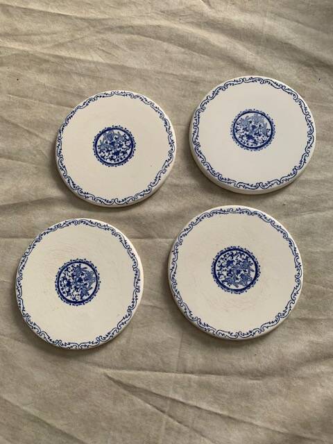 4 Rouen 1932 model bottle coasters in earthenware