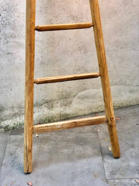 Wooden triangular ladder