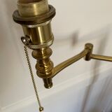 Articulated brass and gold metal floor lamp