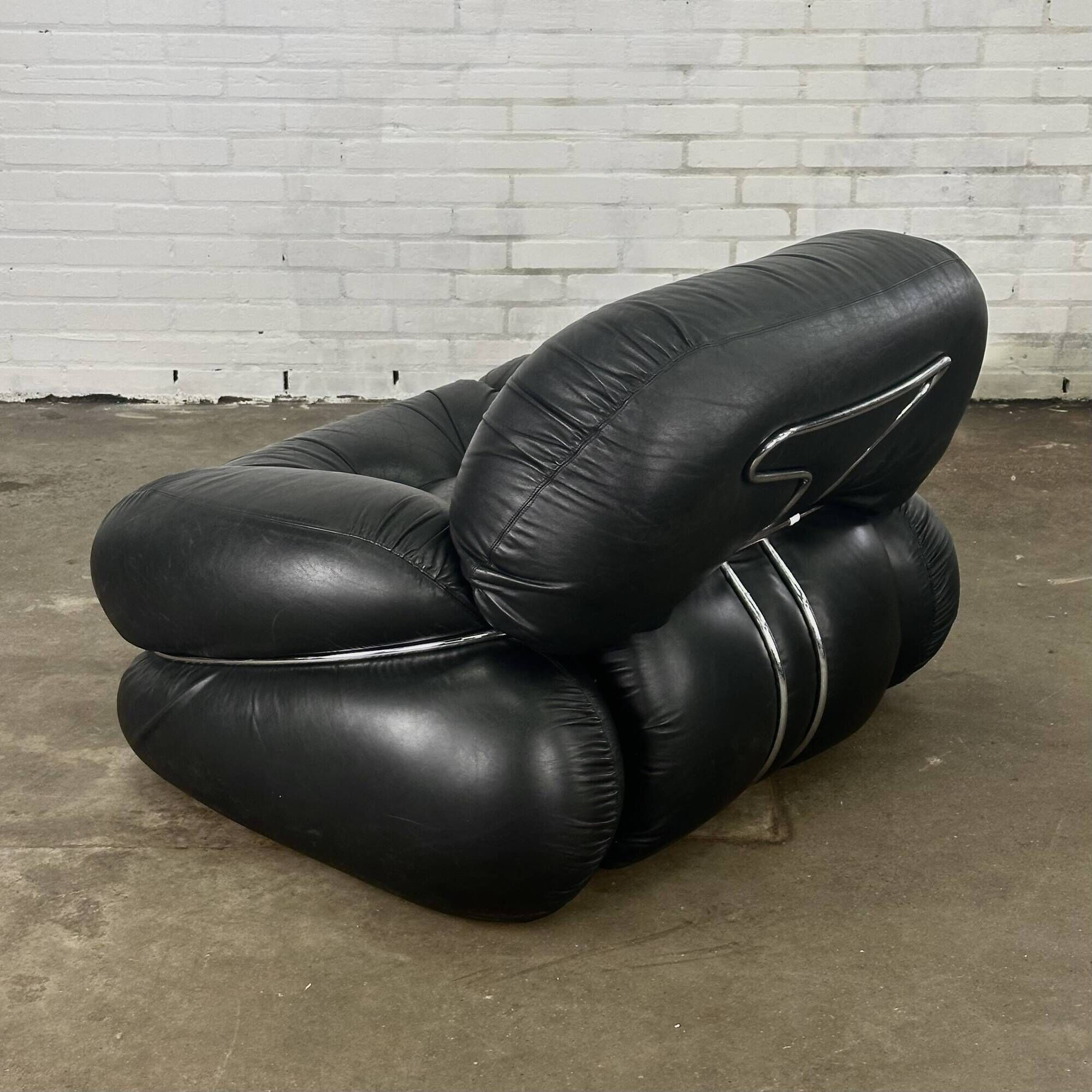 Okay armchair by Adriano Piazzesi in black leather with ottoman