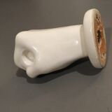 Porcelain pastry in the shape of a fist