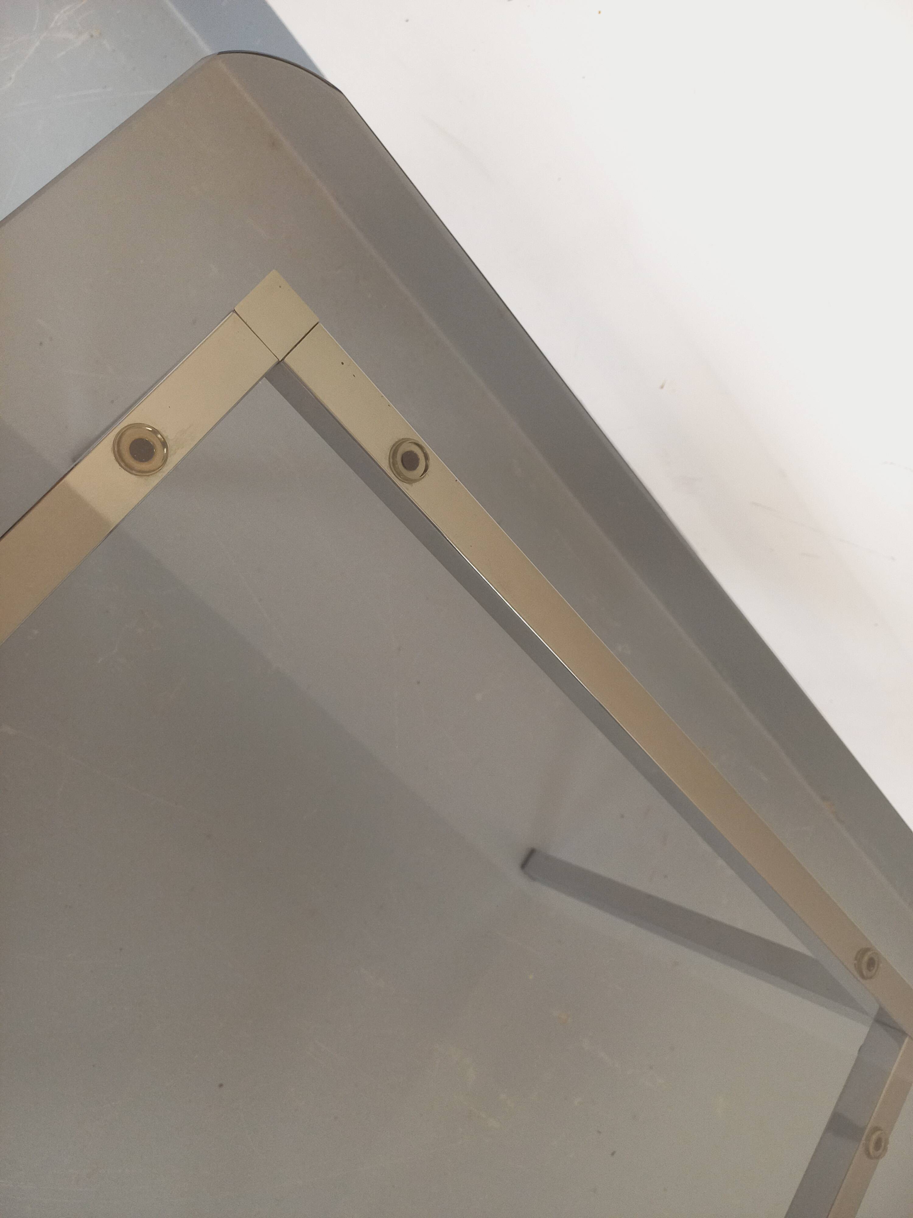 Vintage square coffee table in smoked glass and chrome metal from the 1970s.