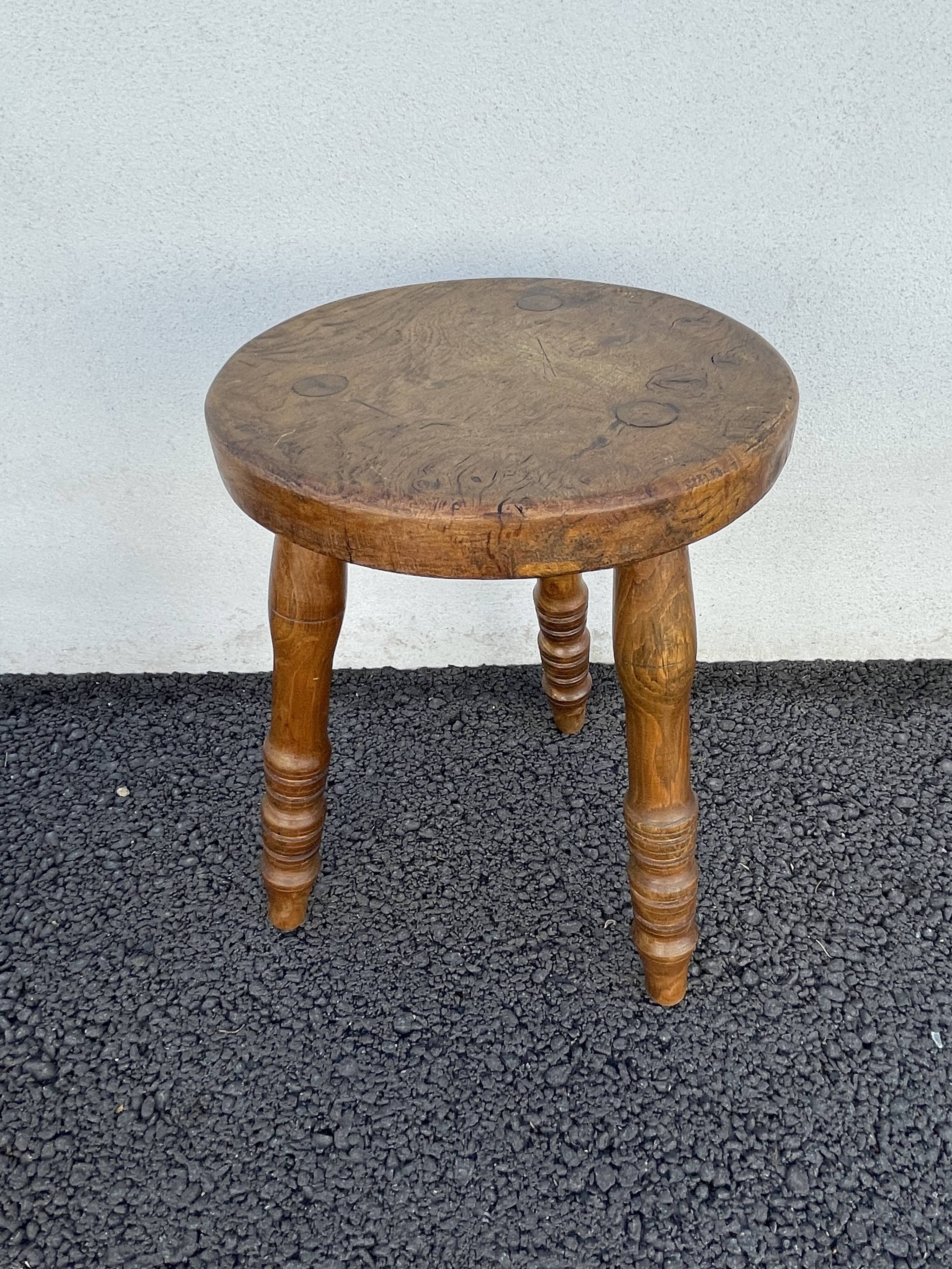 Wooden tripod stool