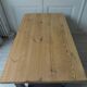 Coffee table on casters made from a vintage table, 1 drawer, 1 slate gray shelf.