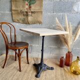 Bistro table in wood and cast iron