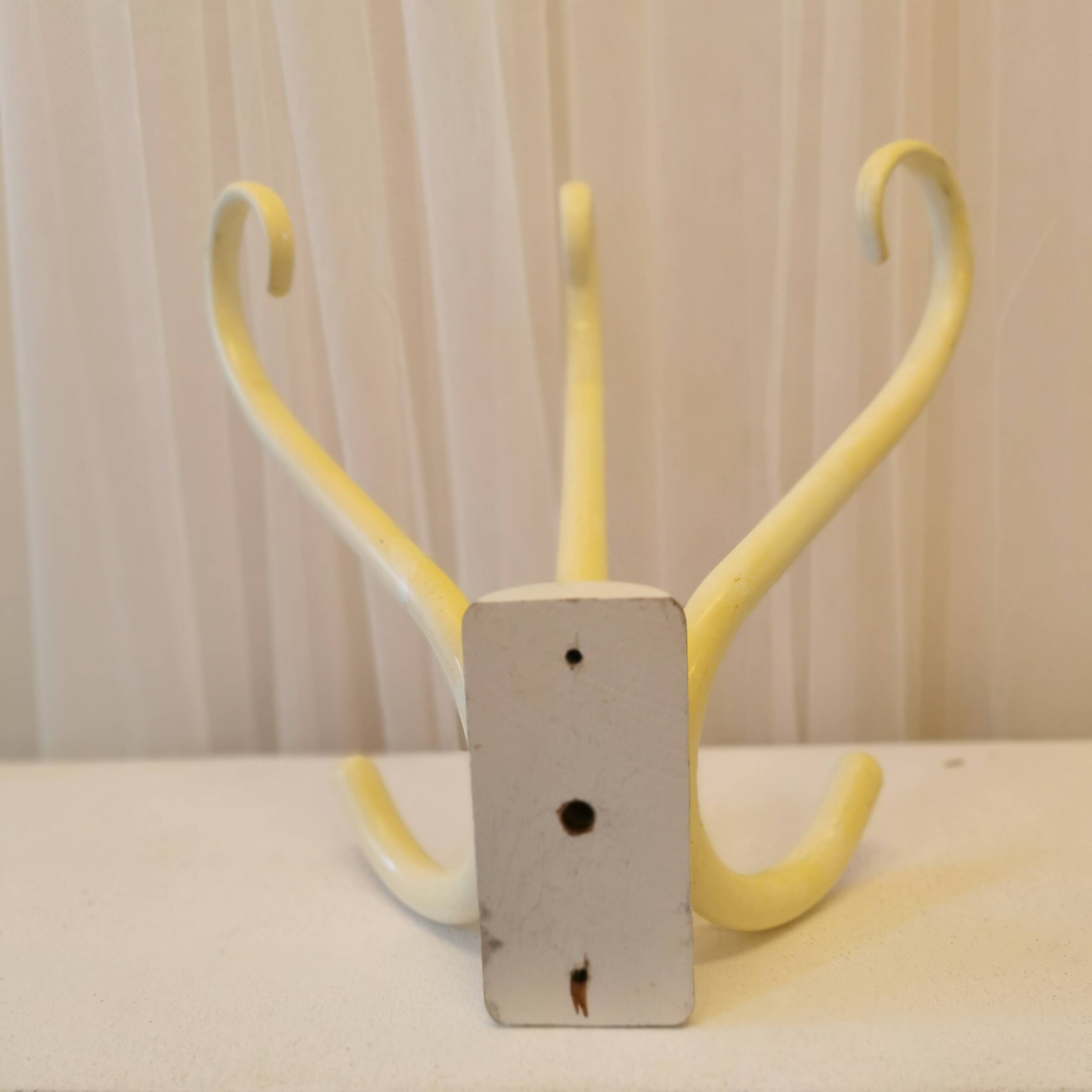 Curved wooden coat hook