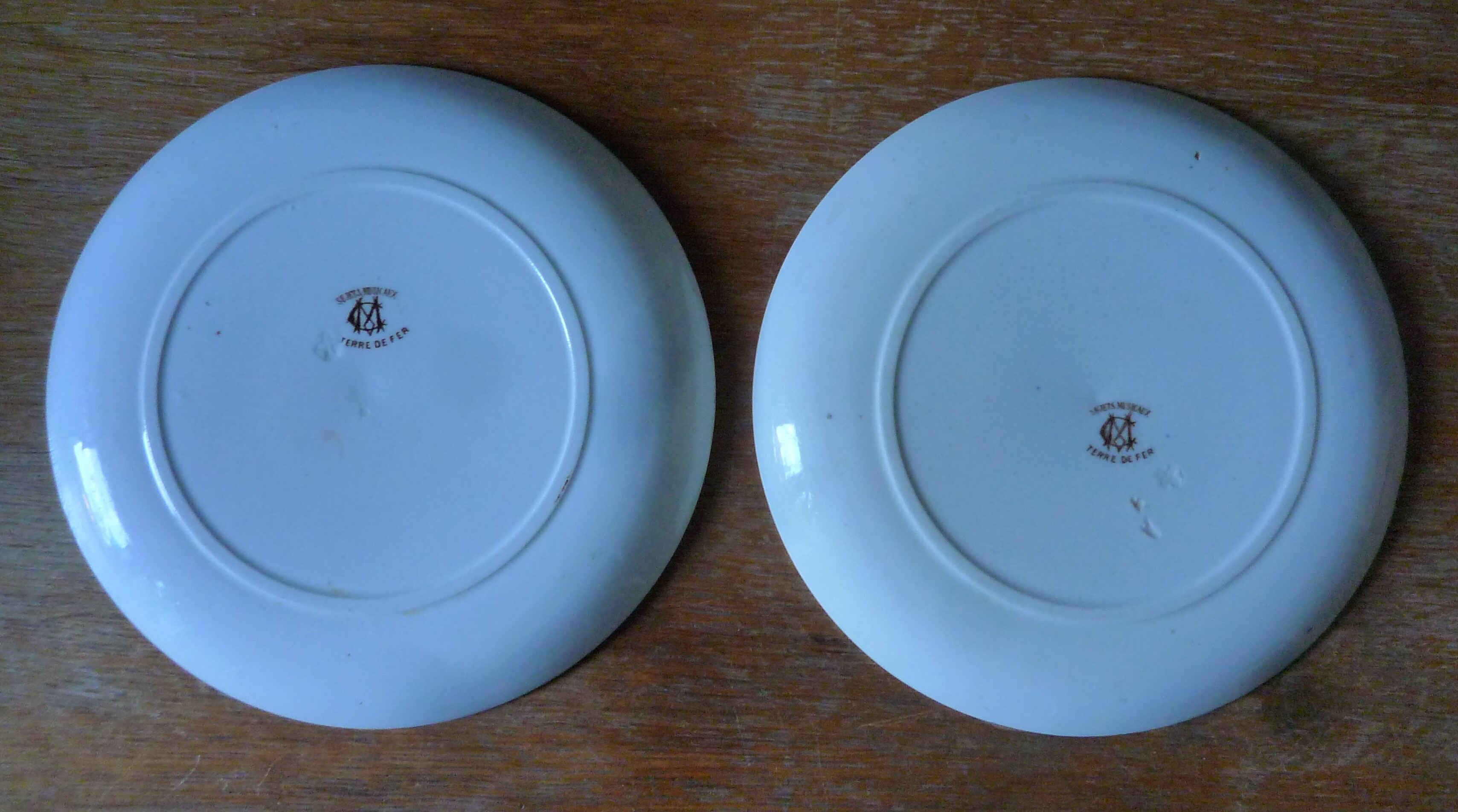 Pair of old plates Terre de Fer / Creil and Montereau, musical subjects