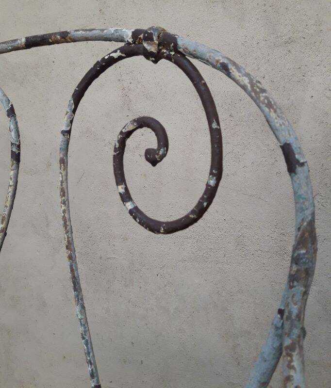 19th-century garden armchair in wrought iron