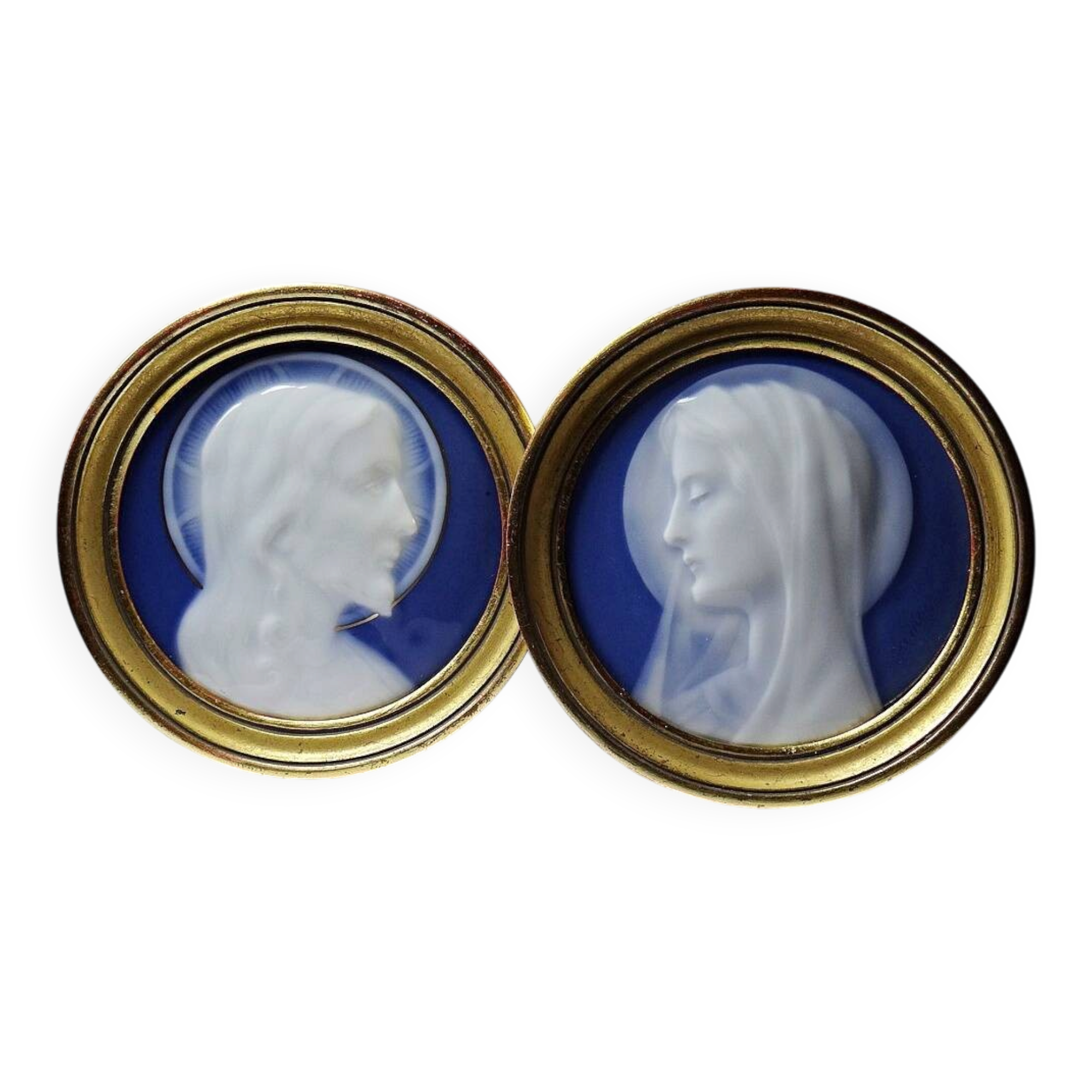 Pair of religious medallions in Limoges porcelain, circa 1900-1930.