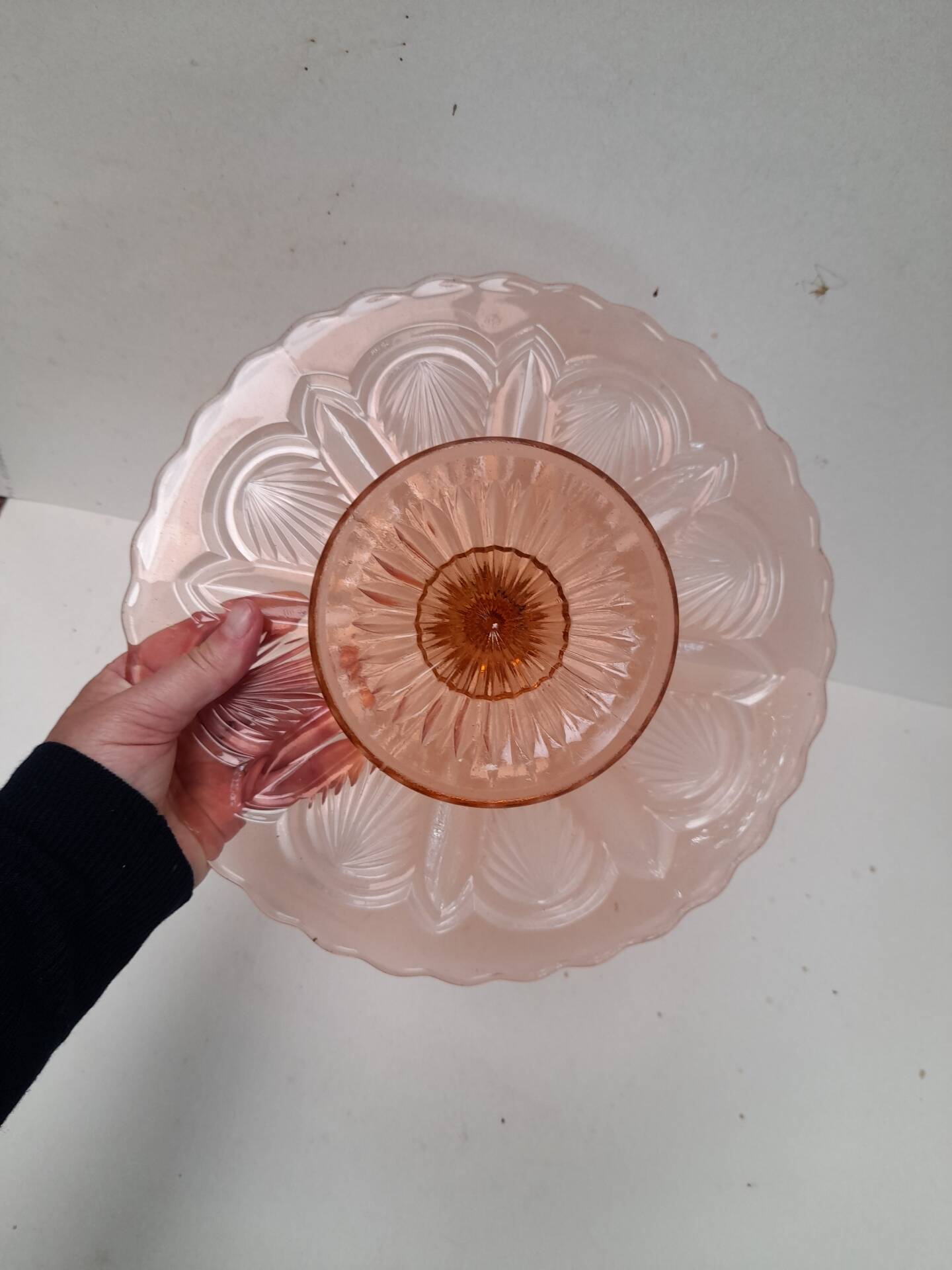 Pink pressed glass cake stand