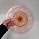 Pink pressed glass cake stand