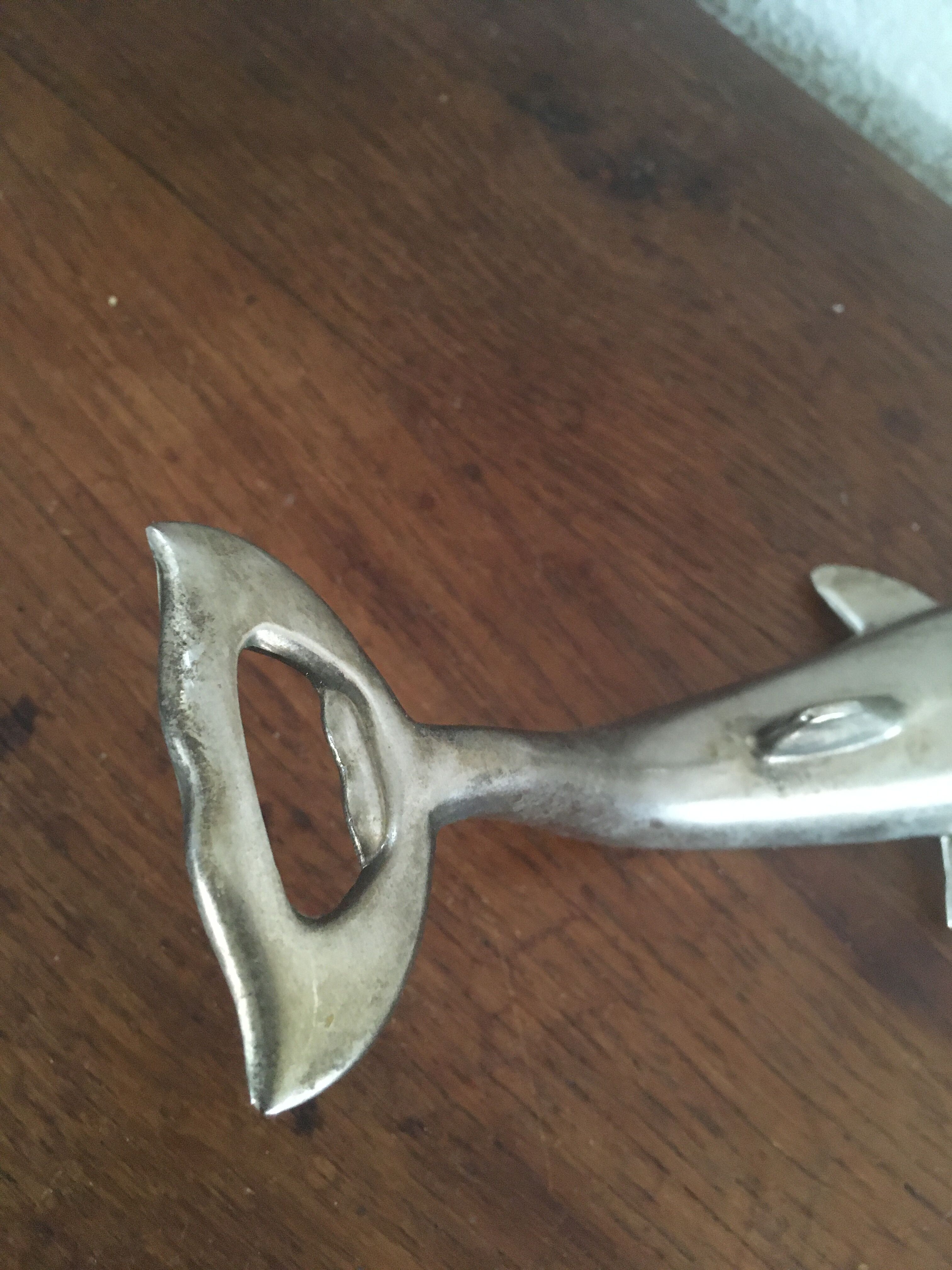 Dolphin-shaped bottle opener
