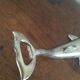 Dolphin-shaped bottle opener