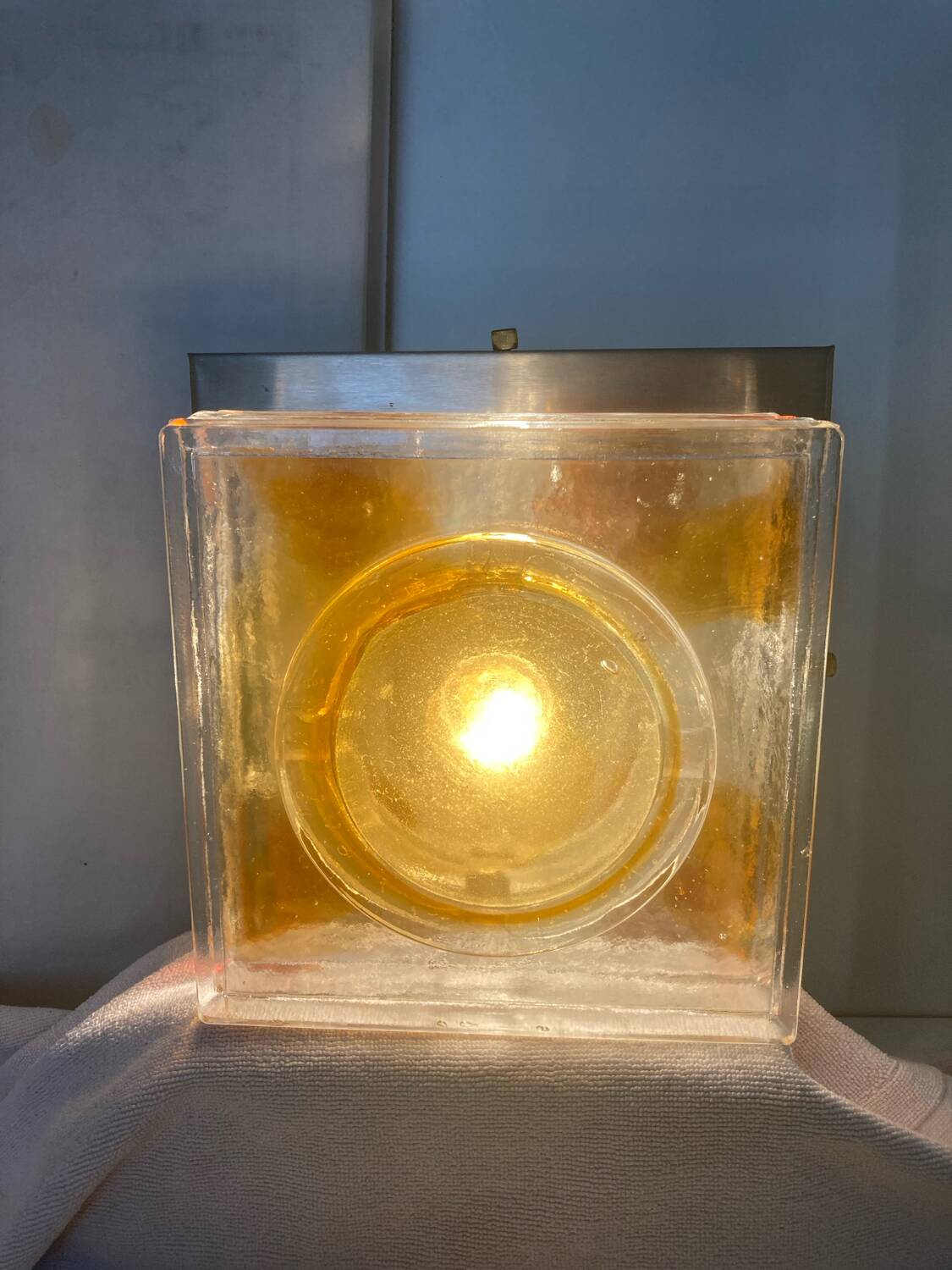 Transparent and smoky glass wall light for vintage Italian Poliarte.