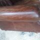 Fauteuil chesterfield à oreille cuir