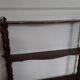 Turned wooden wall shelf