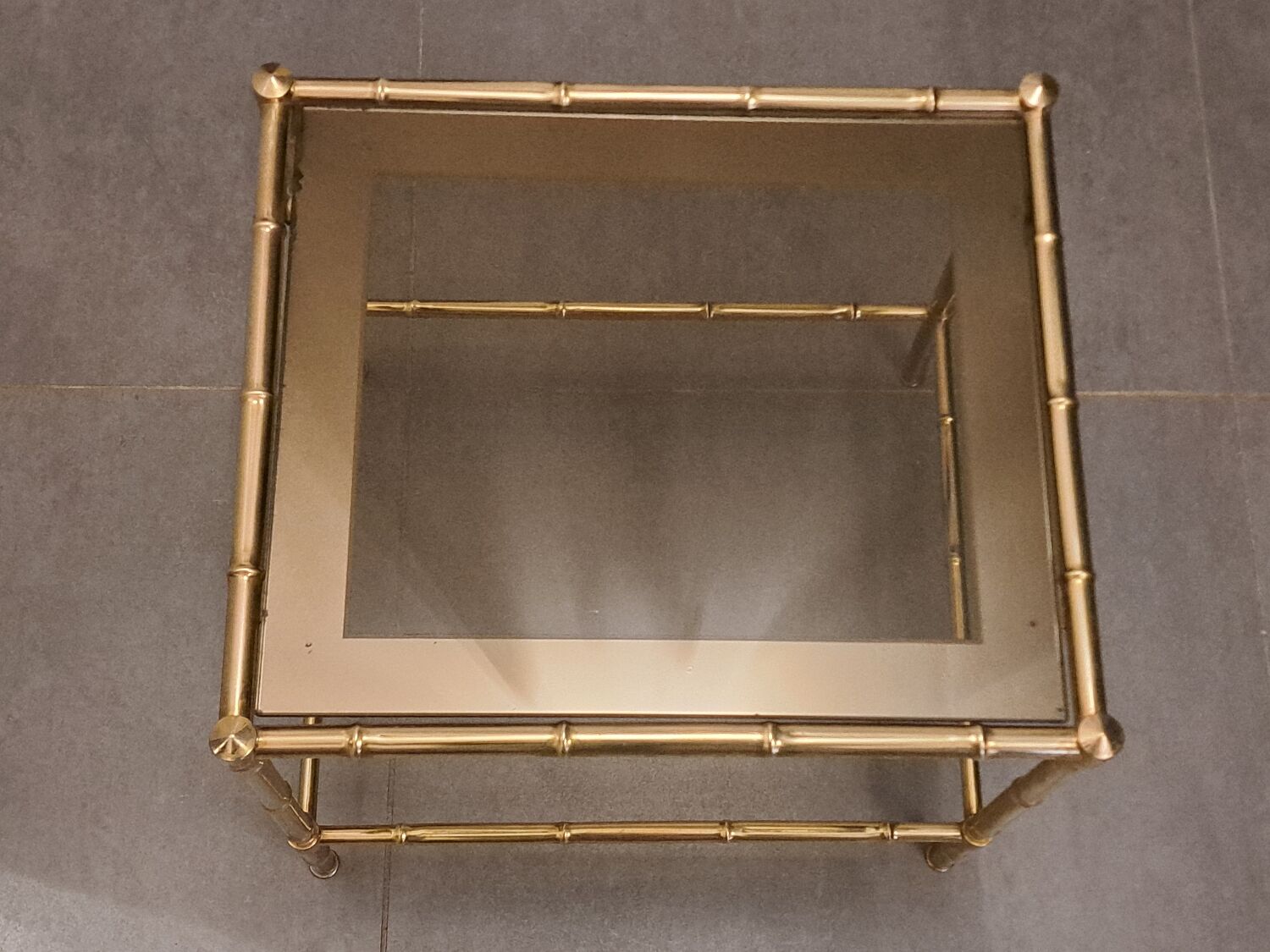 Nesting bamboo tables with gold-plated brass trim