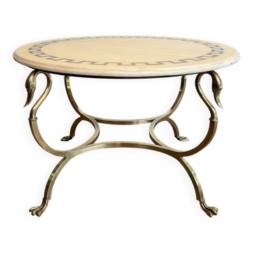 Round neoclassical coffee table in brass with swan necks and legs, and a marble top inlaid with brass from Maison Jansen.