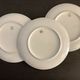 8 flat porcelain plates from Limoges Bernardaud, gilded Greek decoration, twentieth century