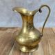 Small antique engraved brass jug