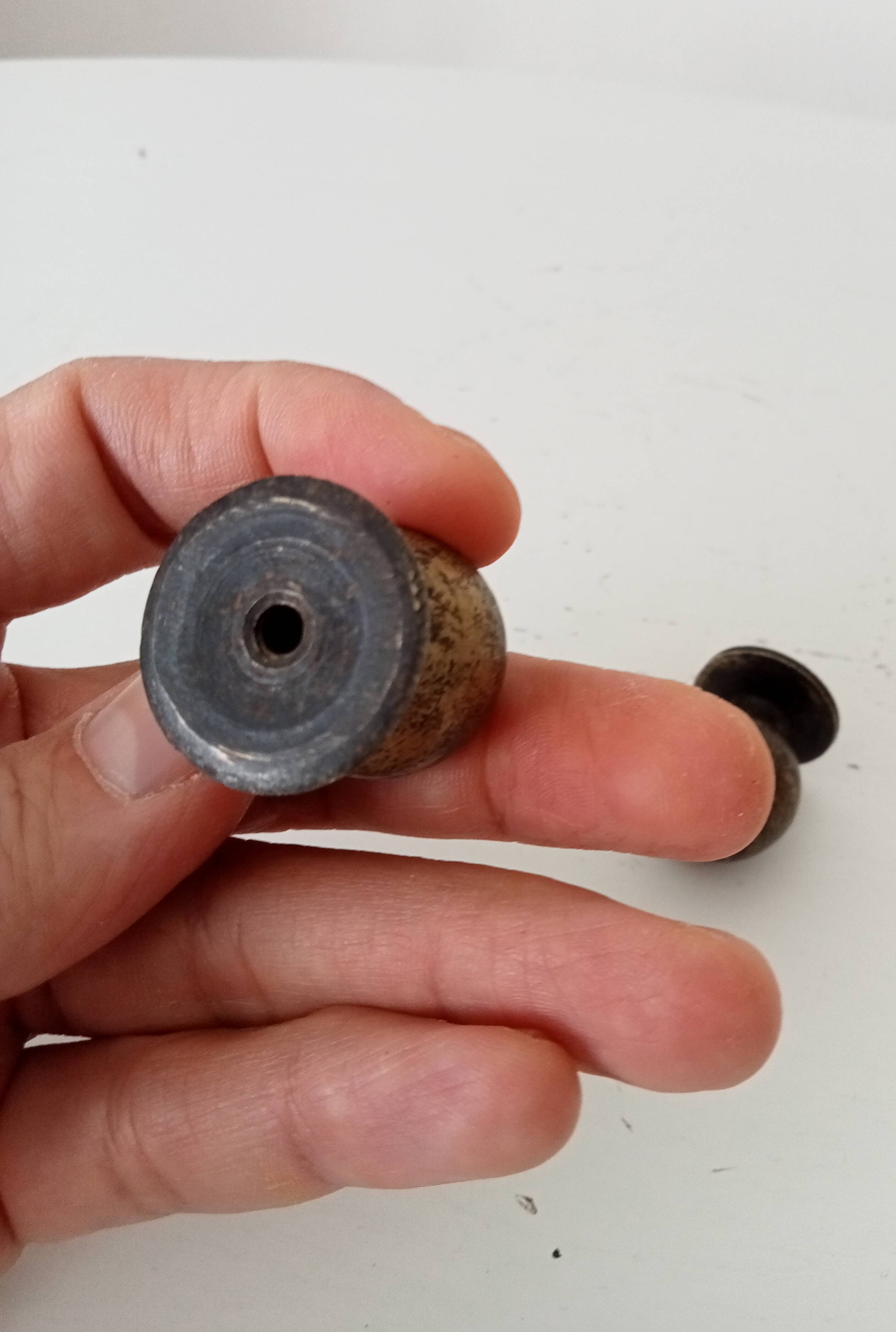 Pair of antique bronze furniture handles.