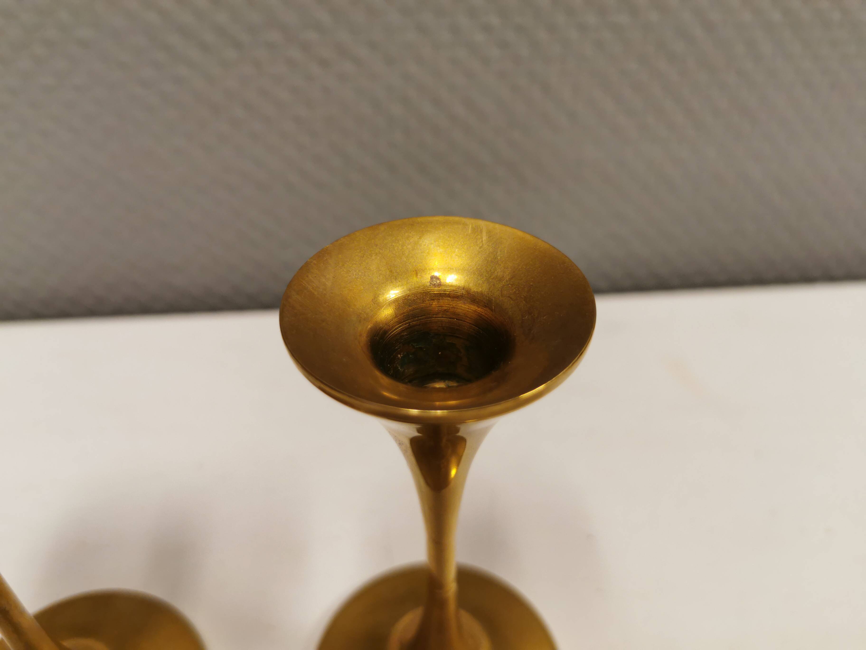 A set of candle sticks, in solid brass, made by Malm Denmark in the 1960s